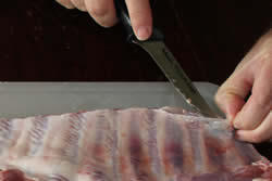 Pull up edge of membrane